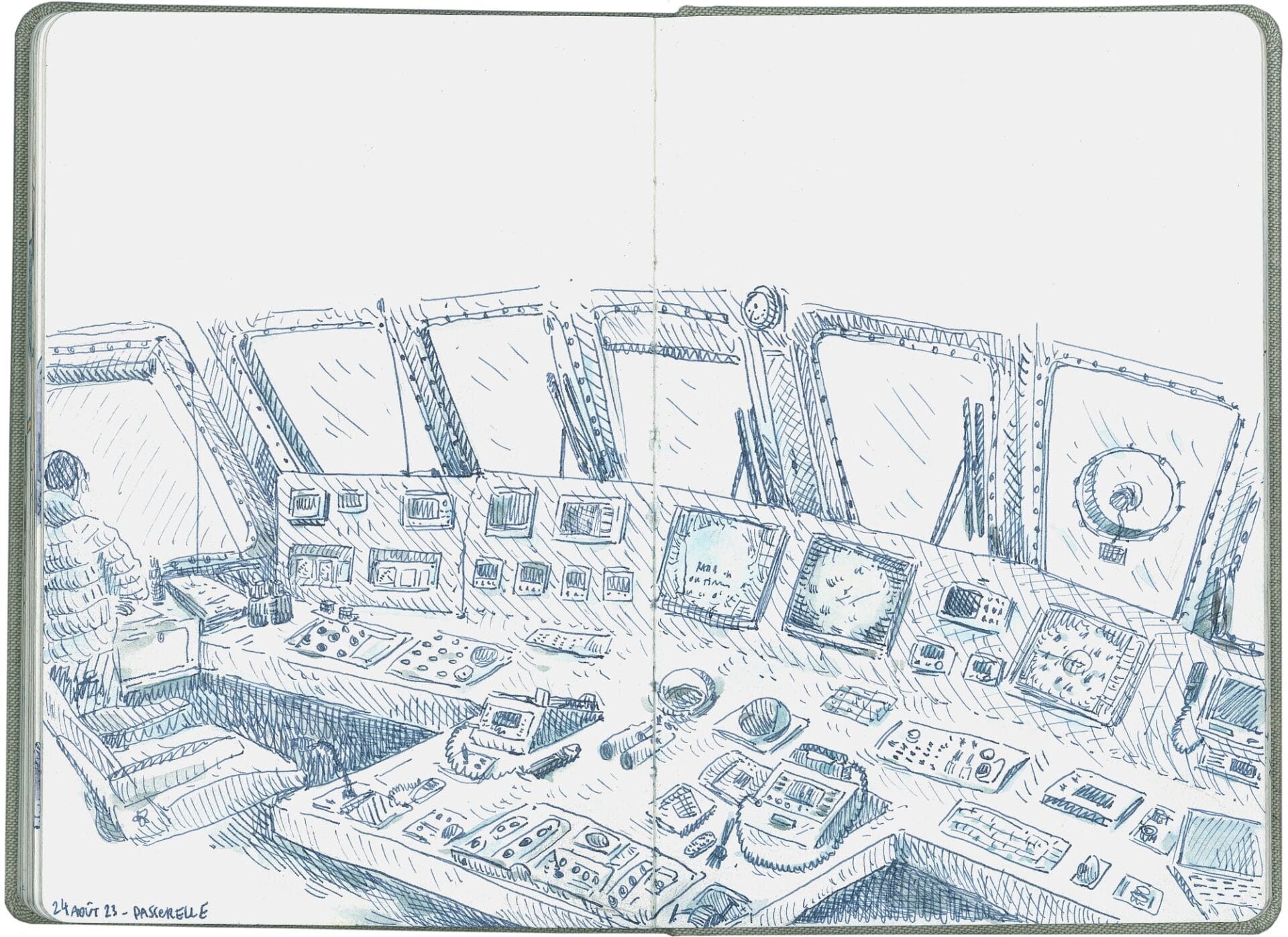 an open sketchbook with a drawing of a ship navigation system