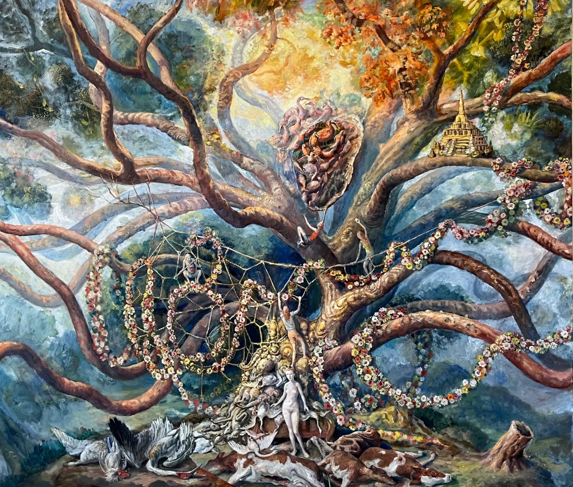 flowers sprawl across a tree with a person standing in the foreground above dead animals