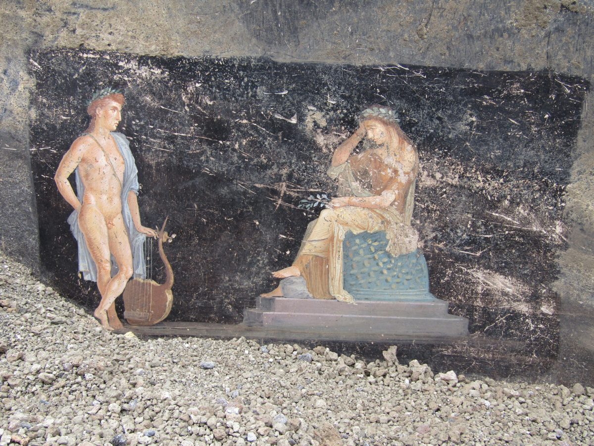 detail of a fresco partly obscured by rubble in a Pompeii home's banquet room, showing Helen and Paris from Greek mythology