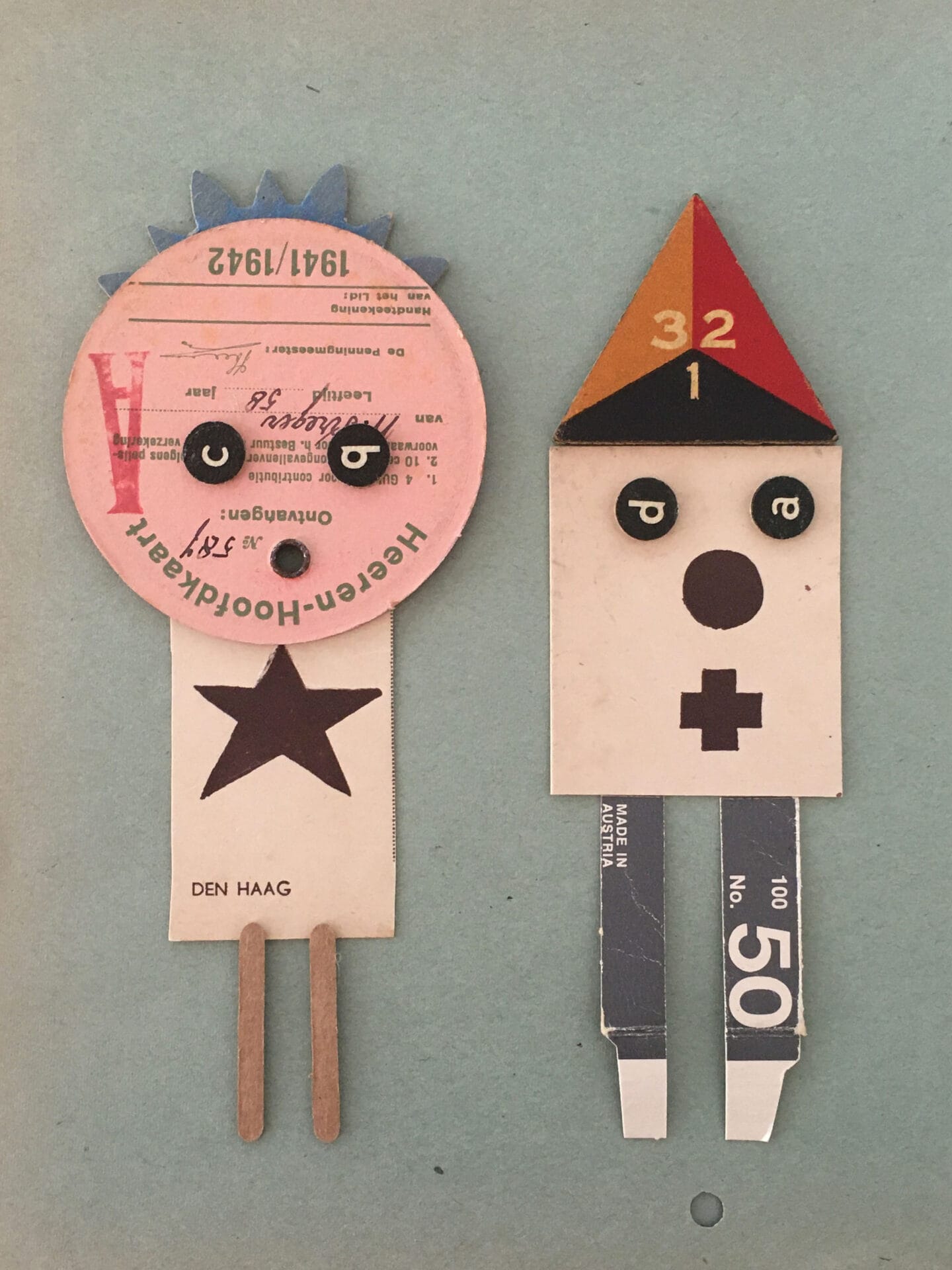 vintage papers collaged into the shape of two standing figures