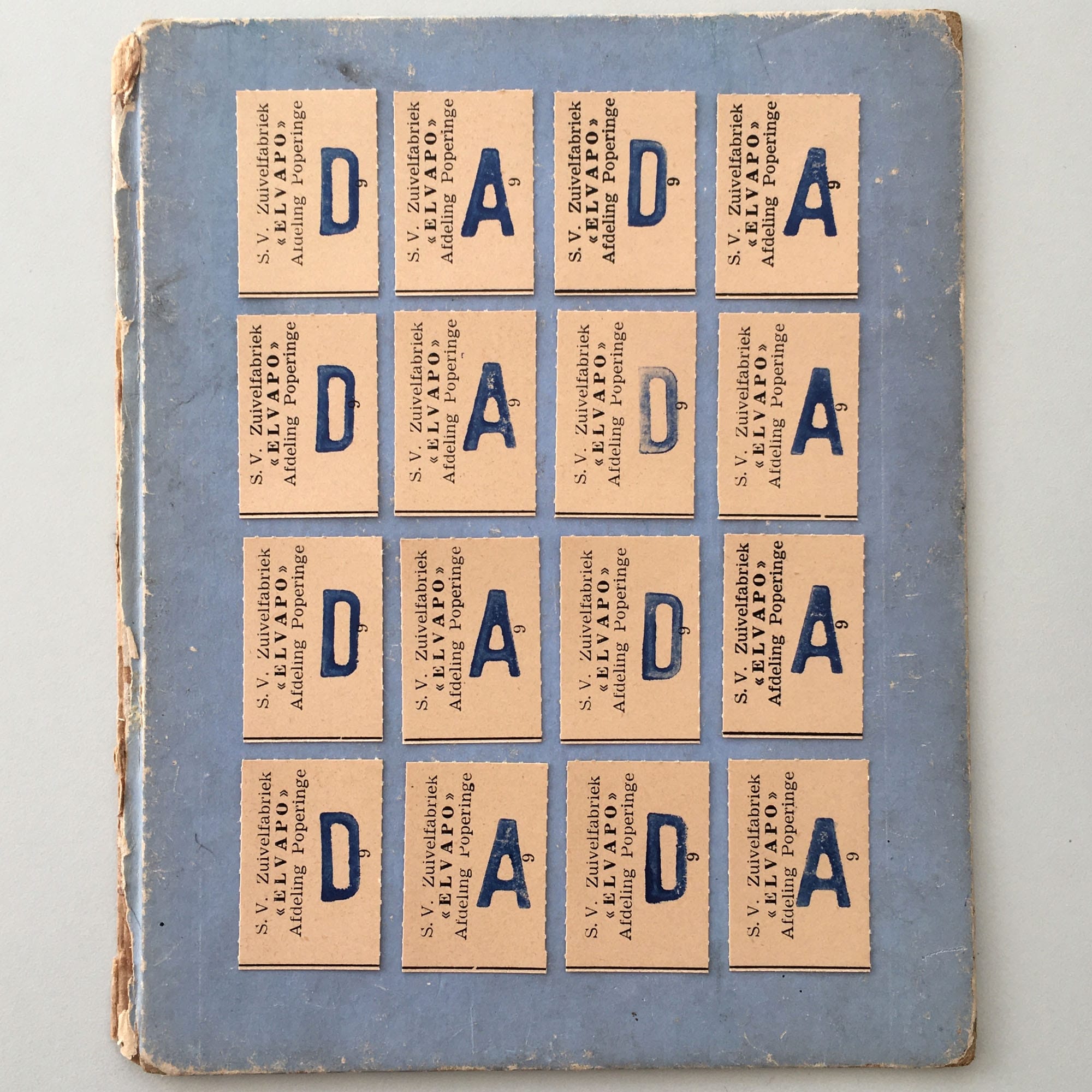 old train tickets arranged in a grid with stamps of the letters D and A.