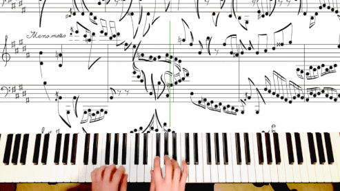 a gif from a video showing a piano performance of a unique composition where the sheet music looks like the portrait of a cat
