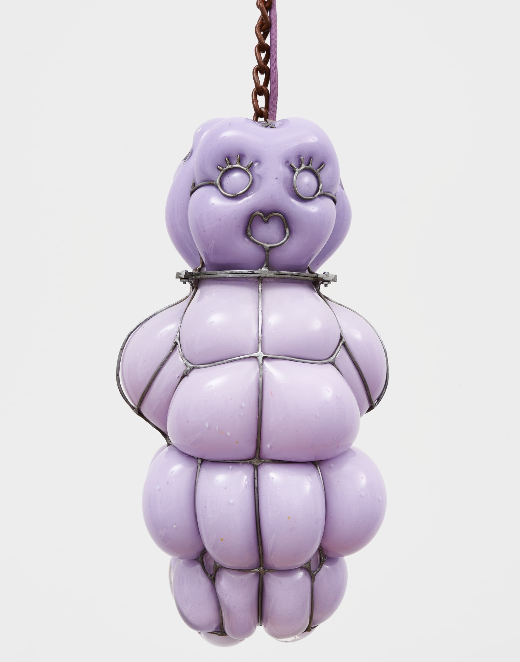 a glass blown pendant lamp hanging from a chain that bubbles inside steel armature and appears like a lavender baby 