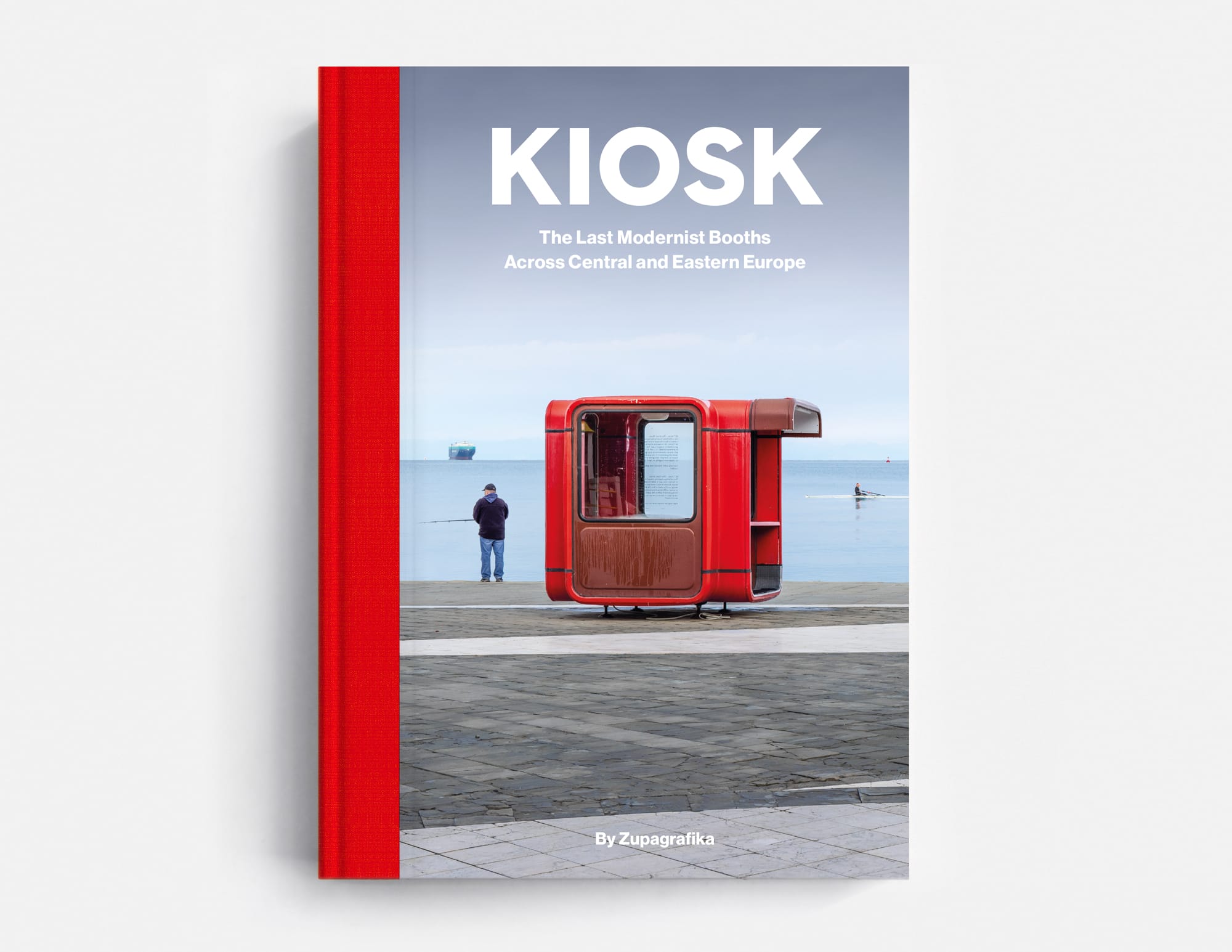 the cover of the book 'Kiosk' featuring a red spine and a photograph of a red modernist booth