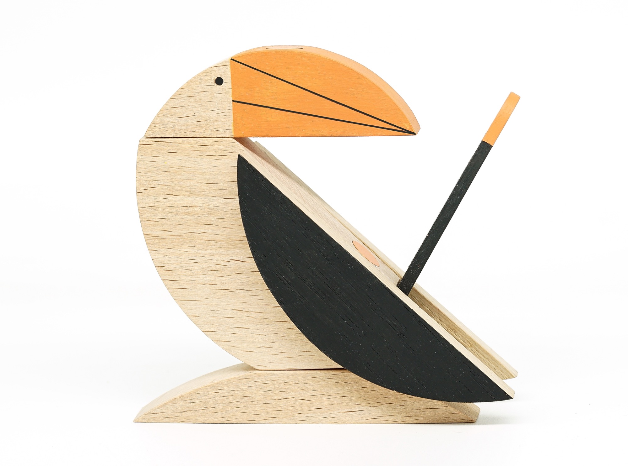 a geometric wooden toy of a toucan