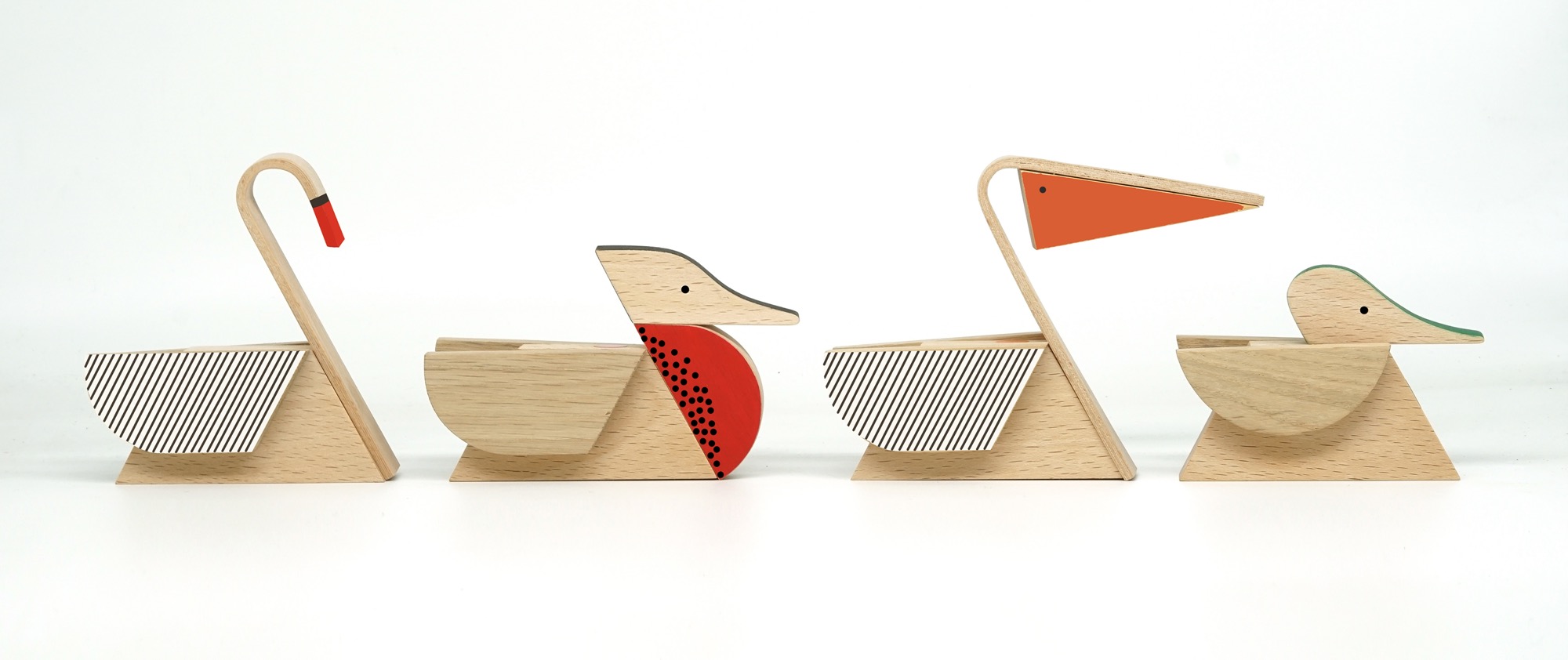 geometric wooden toys shaped like a series of waterfowl